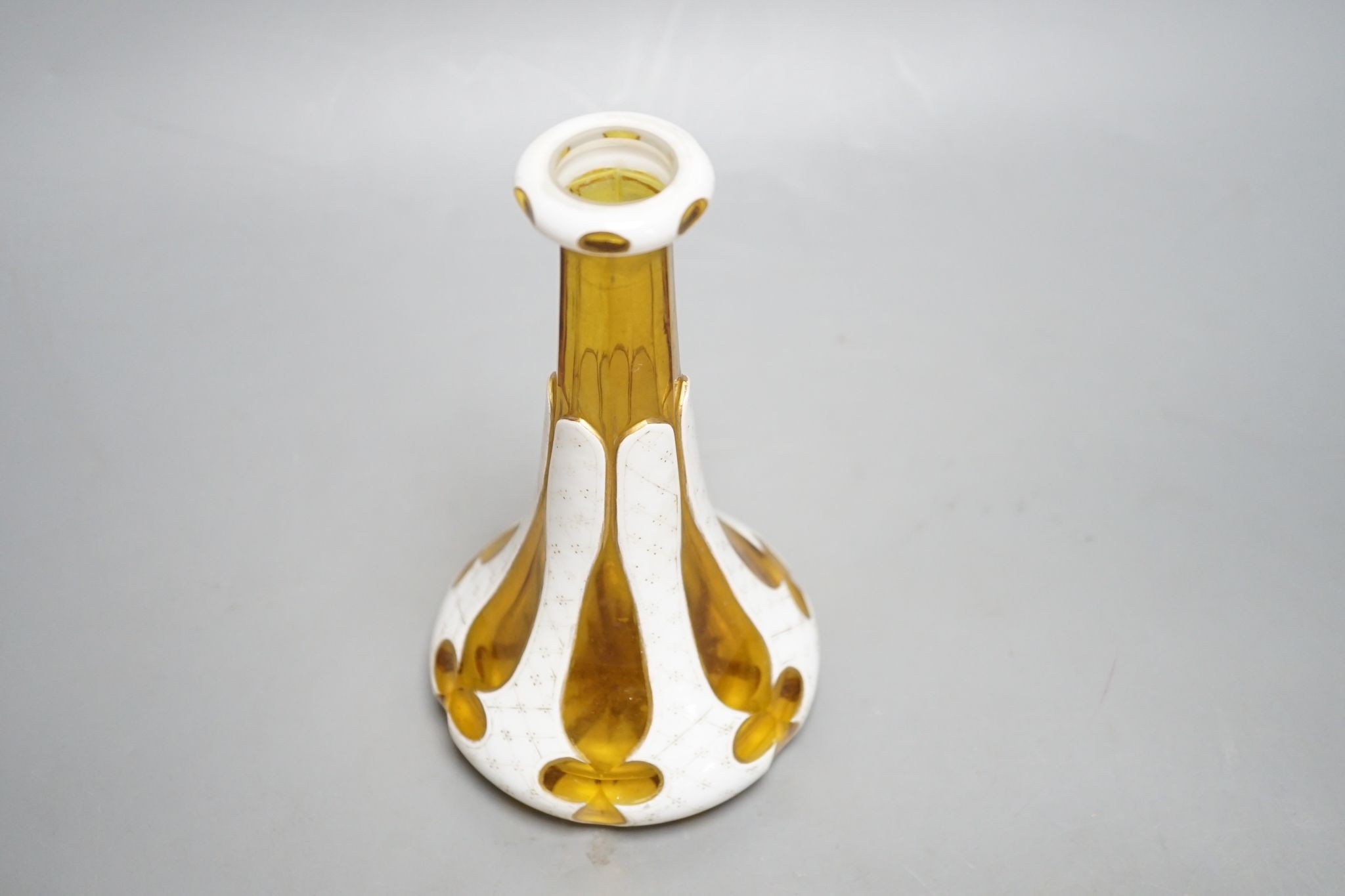 A Bohemian overlaid glass scent bottle, late 19th century, 26 cms high including stopper.